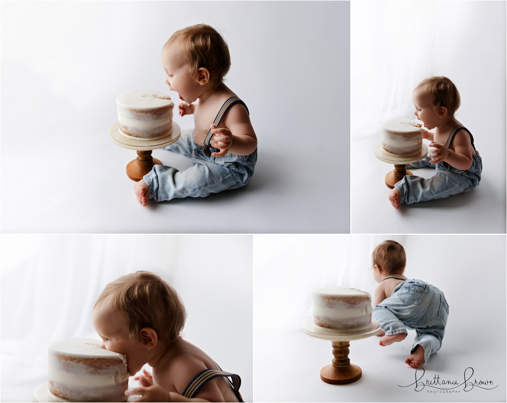 Baby going head first into a cake for his first birthday pictures.