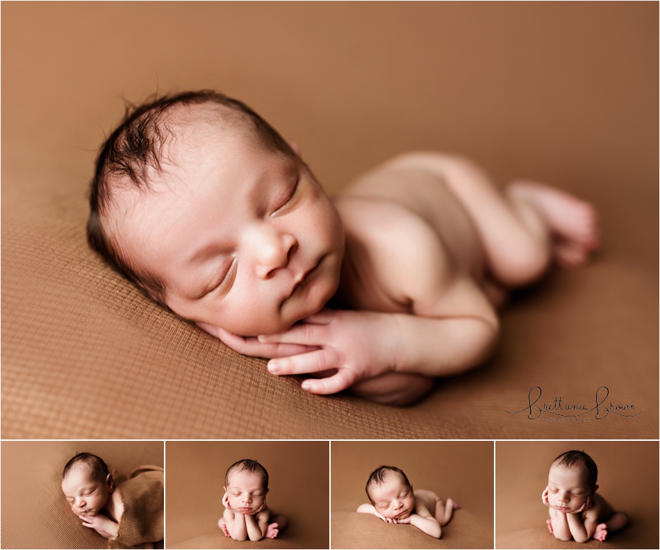 Newborn posed on a brown backdrop for his newborn photoshoot.