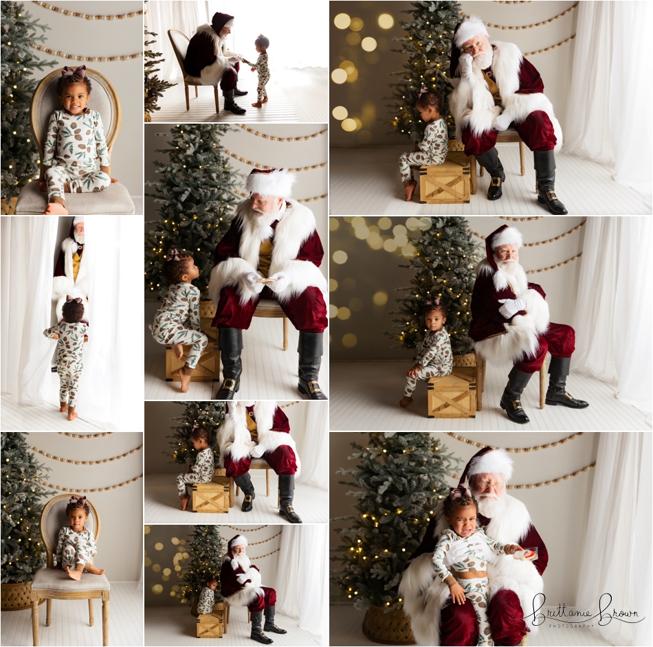 A family sharing a laugh with Santa in the studio.