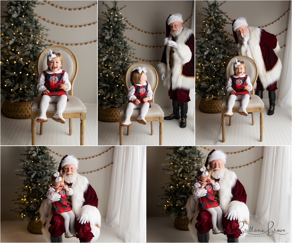 Santa giving a high-five to a little one.