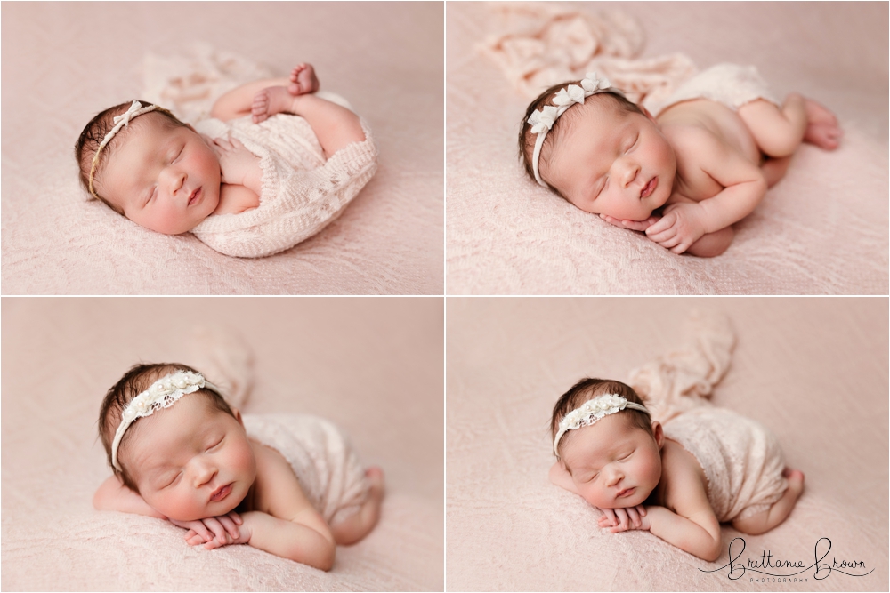 A newborn posed on a cream blanket with delicate details.