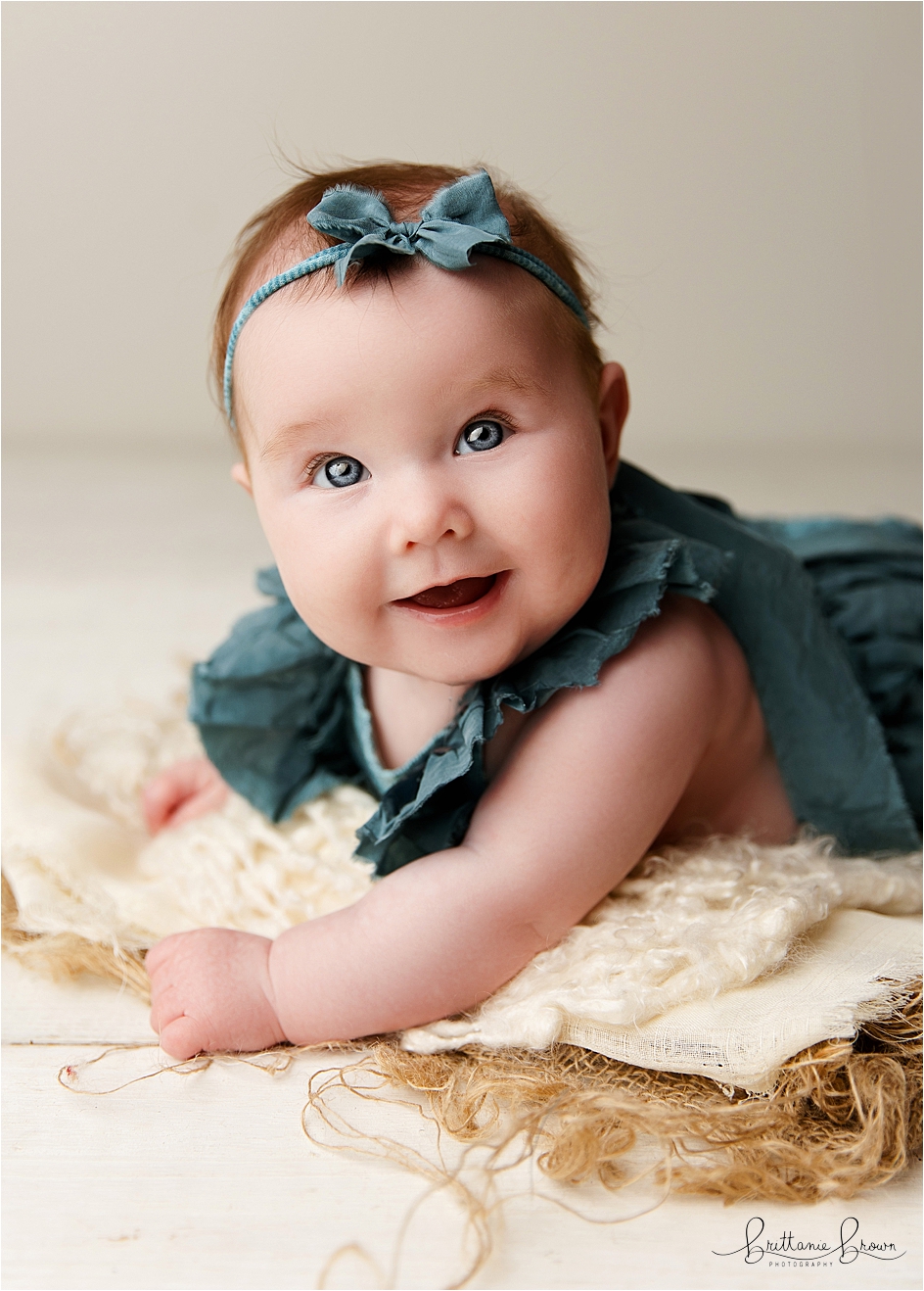 Baby blue eyes in an outfit for my 3 month session.