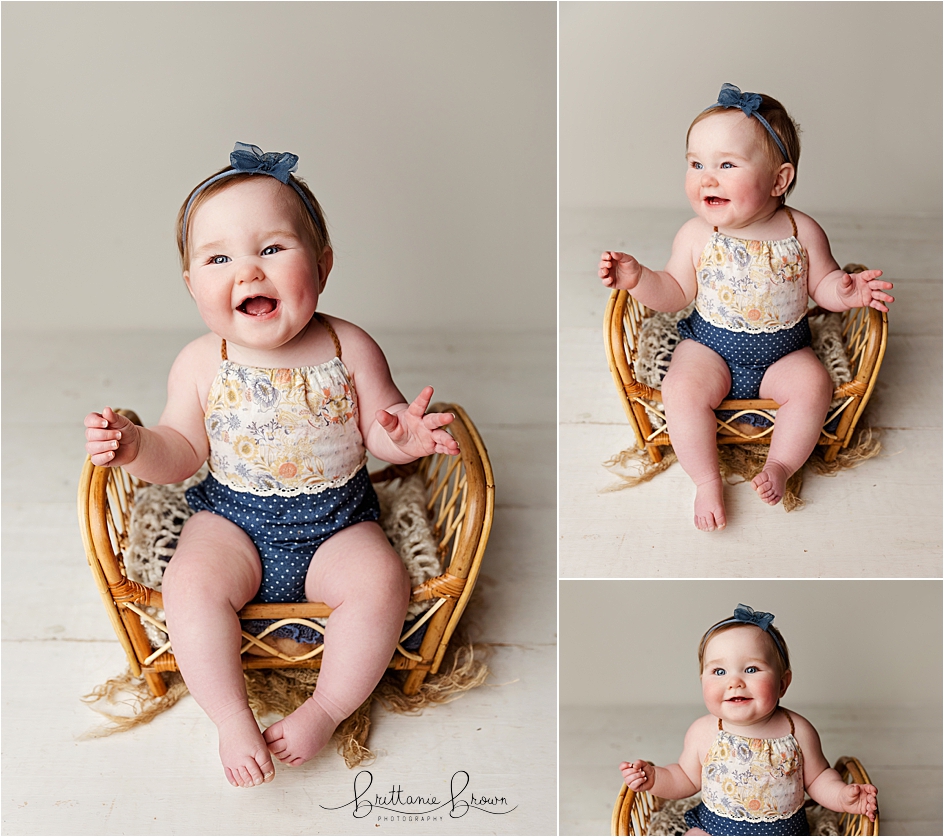 9 month old session sitting in rattan bed.