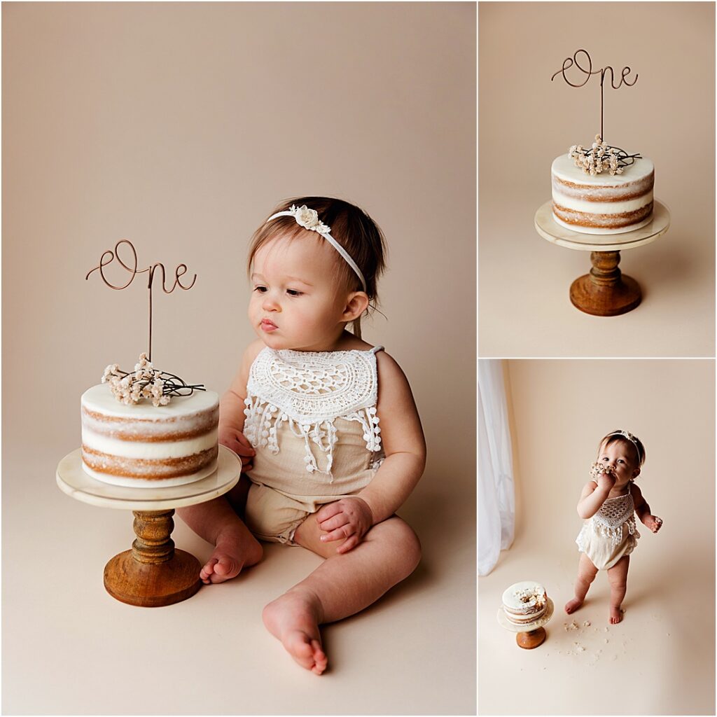 One-year-old baby exploring her birthday cake