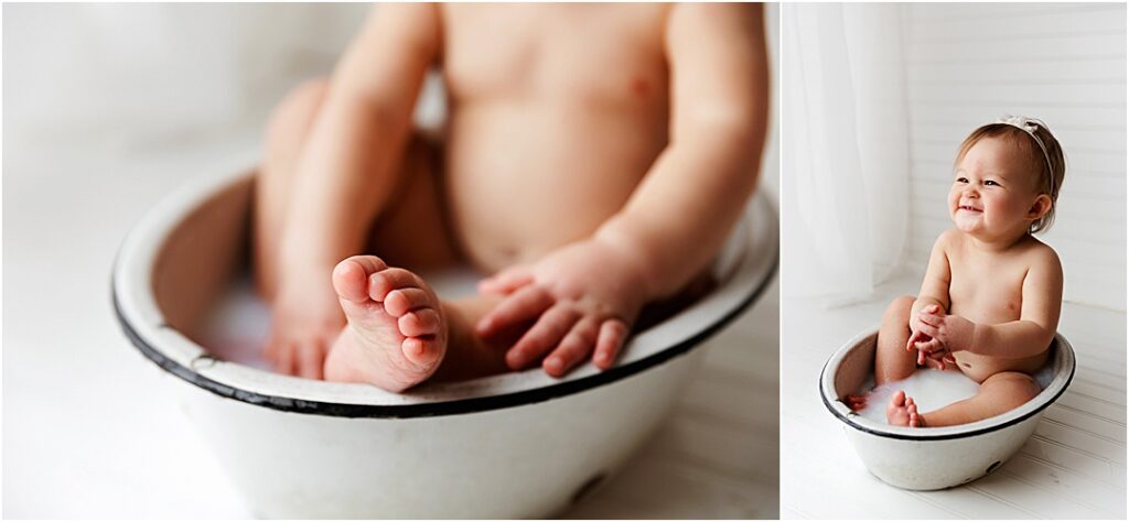 Baby splashing in a milk bath during her one-year photoshoot