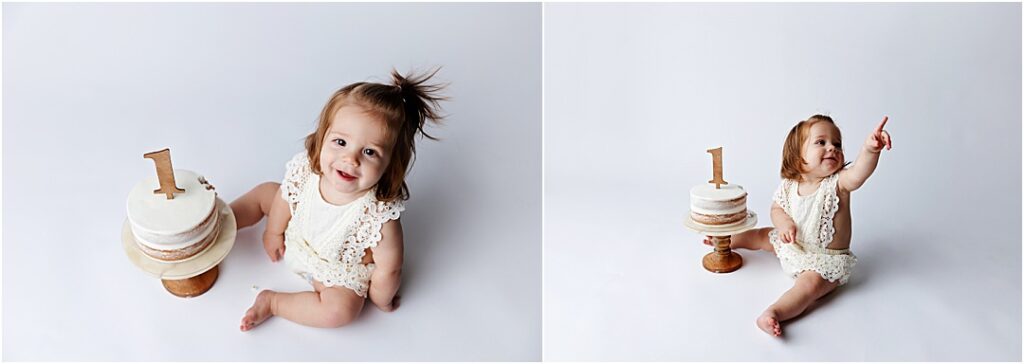 One year cake smash session of Cecilia eating cake.