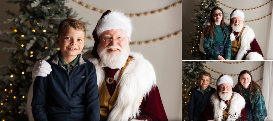 A sibling duo giggling with Santa.