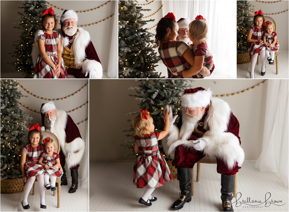 Santa giving a high-five to a little one.