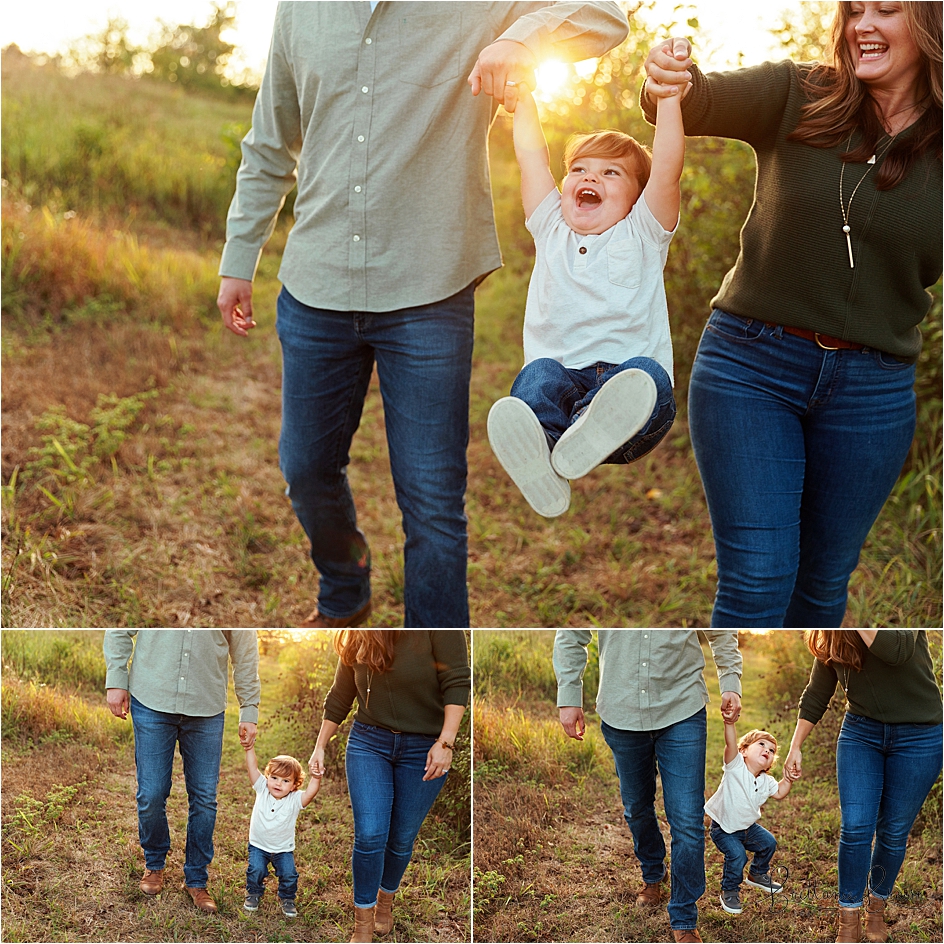 Parents swinging toddler between them with sunlight shining in between.