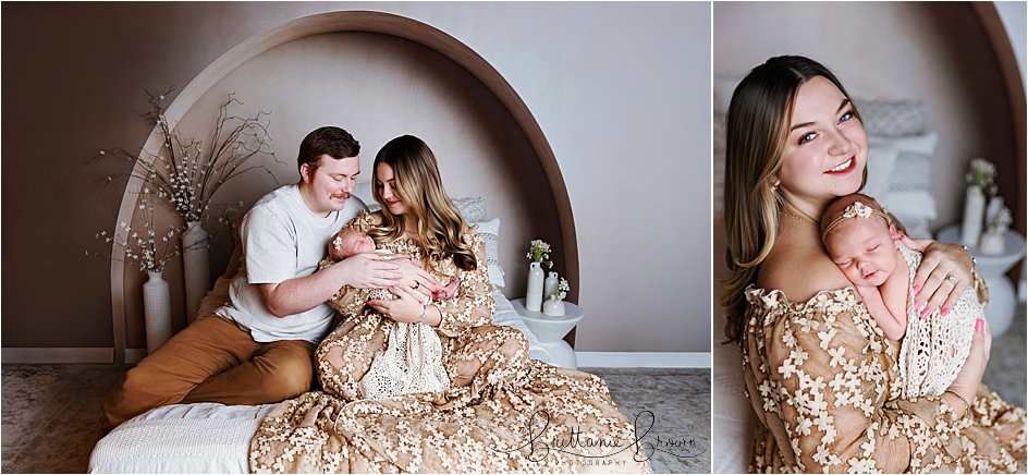 Parents snuggling their newborn during studio lifestyle newborn session