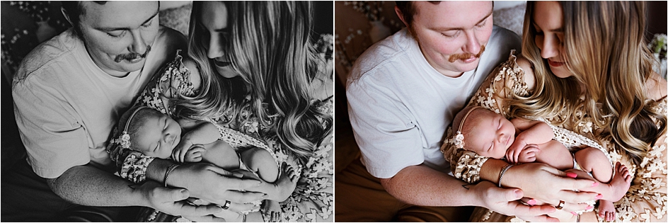 New parents cuddling their baby in a cozy studio setting